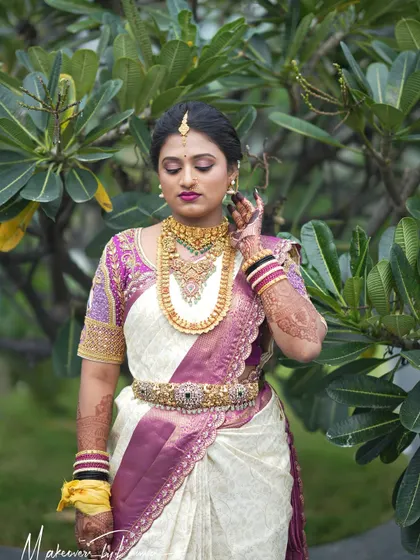 A full-length portrait of bride Pooja, looking serene and elegant on her wedding day.