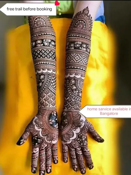 This design features a portrait of a deity within the palm, surrounded by intricate patterns. I offer a free trial before booking to guarantee your satisfaction.