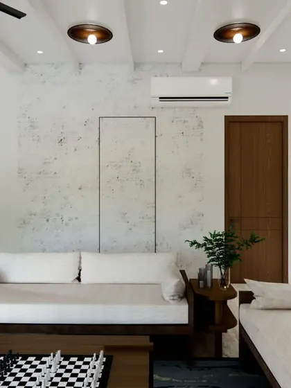 In this part of the Project Yūgen living room, we focused on texture and warmth. The design incorporates exposed ceiling beams, textured white walls, and custom wooden doors to create a cozy, light-filled space.