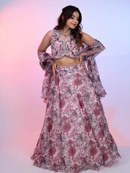 The full look of this floral organza lehenga, showing how the light and airy fabric moves. It’s a perfect blend of traditional print and modern silhouette.