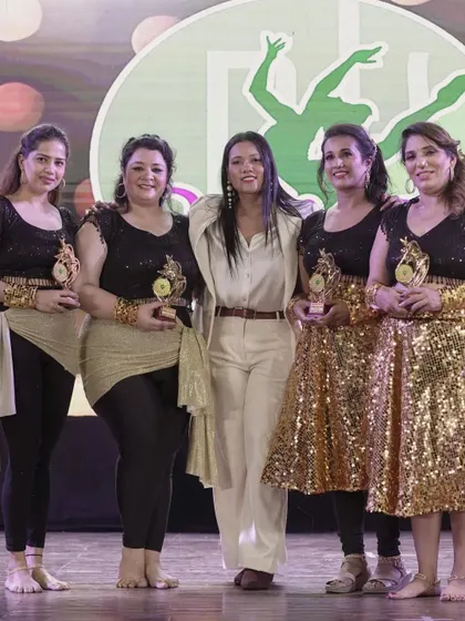 Our 'Dancing Divas' posing after their performance at 'Magnifique 2024'. This event is a celebration of their hard work and dedication throughout the year.