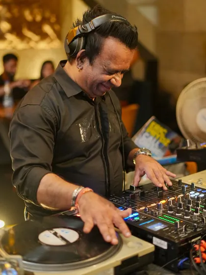 In my element, mixing classic house tunes on vinyl. The hands on feel of turntables is something I'll always love.