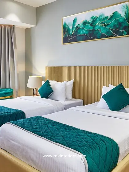 For rooms requiring flexible arrangements, I designed this twin-bed setup. It maintains a cohesive and upscale look with custom slatted headboards, coordinated fabrics, and practical bedside amenities for a comfortable stay.