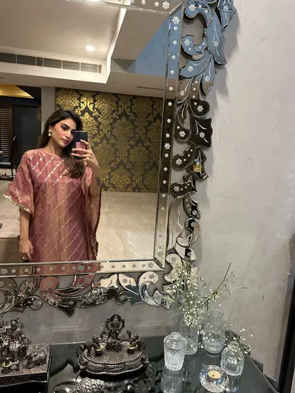 A mirror selfie in another one of my kaftan designs. This one has a beautiful, subtle print that's perfect for daytime events.