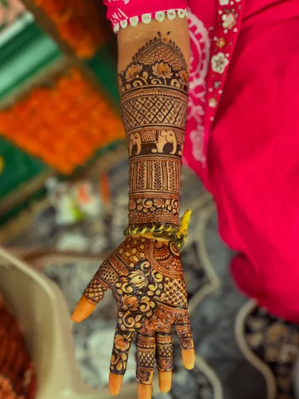 Another single arm view, providing a clear look at the detailed line work and shading in this traditional piece.