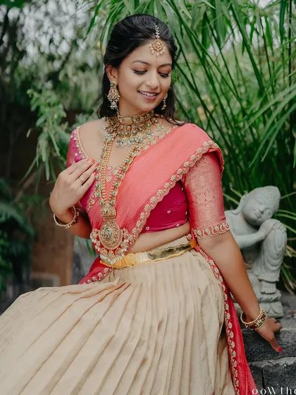 Another beautiful seated portrait, her pose graceful and her smile radiant.