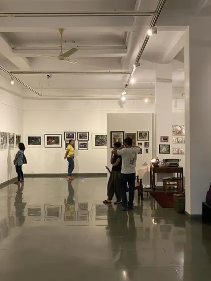 A full view of the gallery, showing the mix of installations and wall-hung art.
