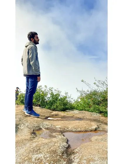 Looking out at the vast expanse from a viewpoint at Nandi Hills. The sense of scale is truly humbling.