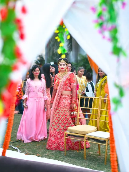 The bride's grand entrance is a moment everyone waits for. We ensure the path is beautifully decorated and everything is perfectly timed for her big reveal.
