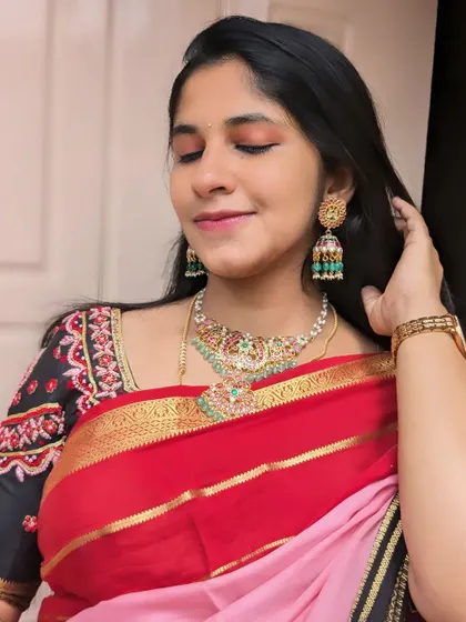 Another look with the same client, this time focusing on the intricate details of the Jadau jhumkas.