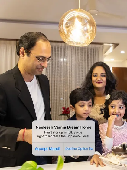 I just finished working with Neeleesh Varma from Brigade Exotica, and he is loving his new home! This picture captures the joy of his family celebrating in their new space.