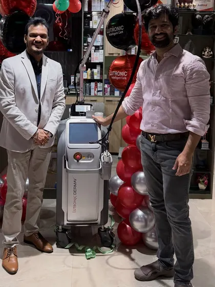 Posing with a colleague at the launch of our Derma V laser. Investing in cutting-edge technology is central to my philosophy of providing patients with nothing but the best, most effective, and evidence-based treatments available.