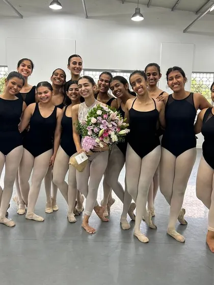 Another shot of the heartfelt send-off for Radha. Her acceptance into a top BFA program is a testament to her dedication and the high-quality training she received with us.