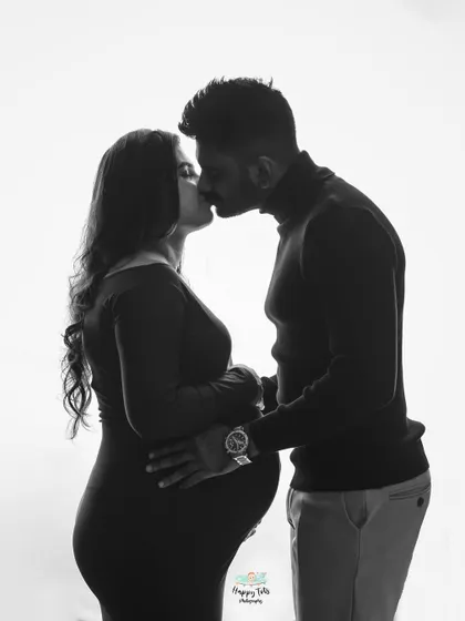 We love playing with light and shadow to create timeless black and white portraits. This intimate kiss captures the deep connection between the couple in a simple, yet powerful way.