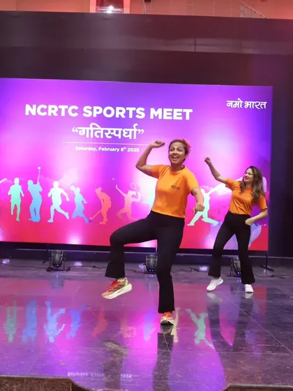 Our instructors demonstrating a move on stage at the NCRTC Sports Meet. We provide clear, easy-to-follow instructions for everyone.