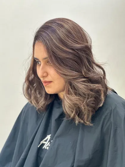Another angle of this soft and pretty brunette balayage.