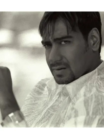A classic, intense black and white portrait of Ajay Devgn for Cineblitz magazine. The tight crop and his direct gaze create a powerful and moody image that reflects his on-screen persona.