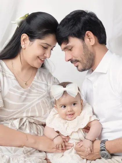 A moment of pure connection, with foreheads touching. These intimate poses create incredibly powerful and emotional family photos.