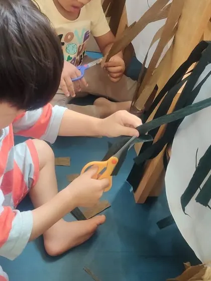 The children are so engaged in this activity, demonstrating how a well-planned, inquiry-based lesson can capture their full attention.