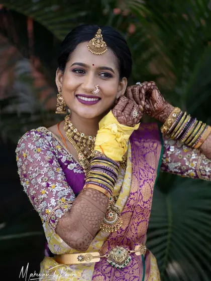 Jagruthi looking joyful and radiant while getting ready.