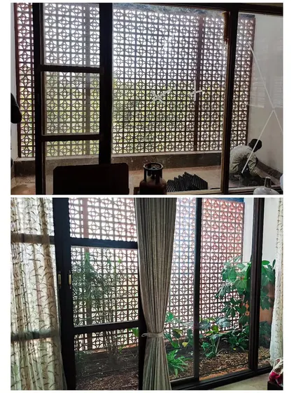 This before-and-after shows an indoor landscaping project for a courtyard visible from the living room, turning a barren patch into a small private garden.