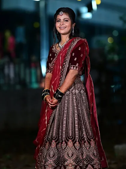 This bride looks confident and happy, ready to celebrate her reception. Her makeup is elegant and timeless, ensuring she will love her photos for years to come.