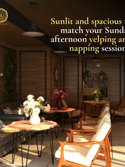 Sunlit and spacious to match your Sunday afternoon. This rustic-chic cafe or living space with natural wood and comfortable seating is perfect for relaxing.