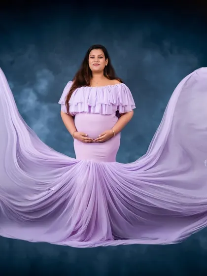 The full effect of our lavender flying gown. The fabric tossed in the air creates a breathtaking shape, turning a simple portrait into a work of art.