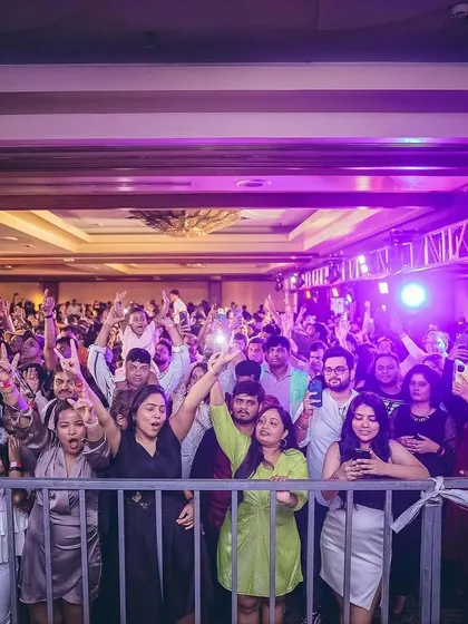 The front row of the crowd, fully immersed in the New Year's celebration. It's my job to make sure everyone feels like they are part of the show.