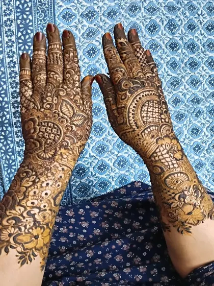 A full-coverage design with traditional Indian motifs, perfect for a festive occasion.