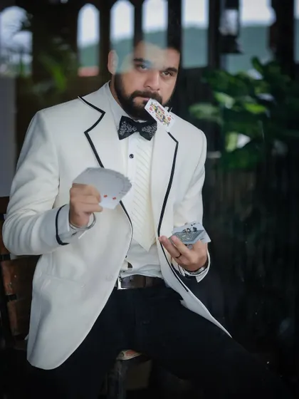 Another shot from the magician-themed series with Kshitish Date, where the formalwear helps build the narrative.