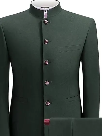 A classic bandhgala or Nehru jacket suit in a solid dark green. This is a versatile outfit that can be dressed up or down for any occasion.
