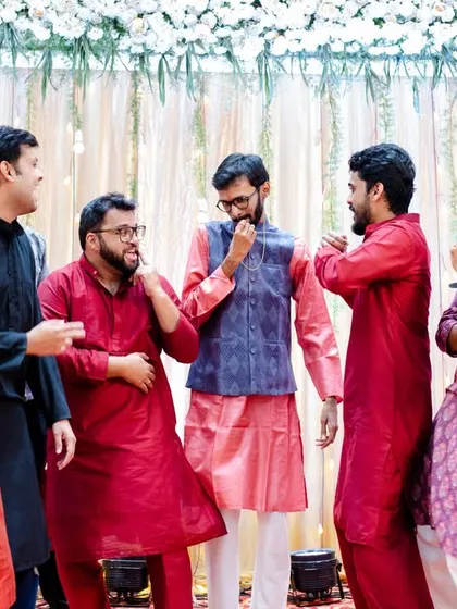 The boys plotting their next move or just having a laugh. The camaraderie between a groom and his friends is always great to capture.