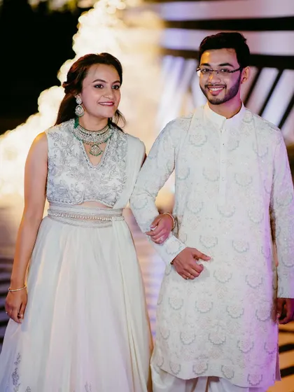 A beautiful couple shot. Her makeup looks flawless and elegant as she walks in for her event.