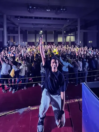 A night to remember at Wonderla. A photo with the massive crowd, my hand raised, sharing a moment of pure joy and music.