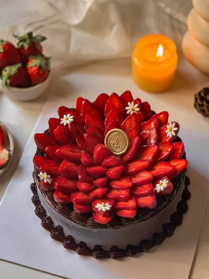 Another view of our Chocolate Strawberry Cake, highlighting the abundance of fresh strawberries covering the rich chocolate ganache. It's a truly indulgent way to celebrate strawberry season.