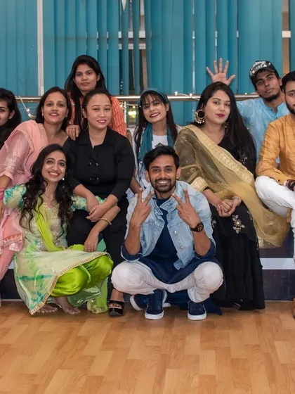The full Aura family posing together during our grand Diwali celebration.