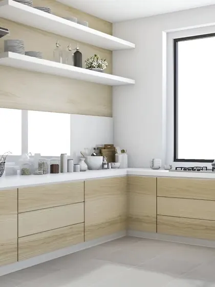 Open floating shelves are a great way to keep everyday items within easy reach. In this design, they create a light, airy feel and provide a space for both practical storage and decorative plants.