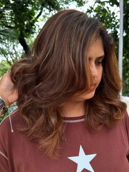 A close-up of her travel-ready style.