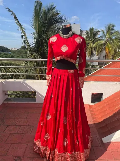 The full view of the red and white lehenga set, a timeless combination.