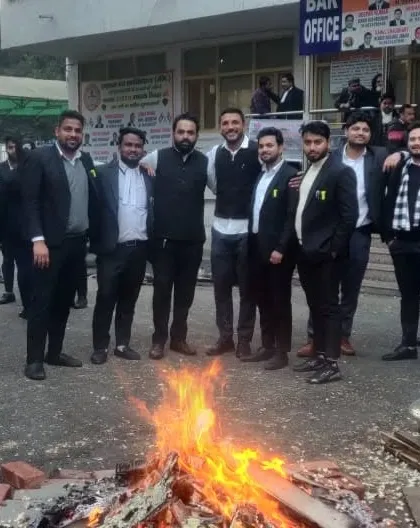 The warmth of the bonfire and camaraderie during the Lohri festival at the court complex.