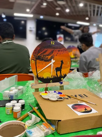 A close-up of a clock being painted during our corporate workshop at the LinkedIn office. A unique and functional piece of art to remember the day by.
