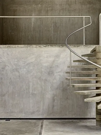 We believe in questioning the definition of craft in a digital world. This sculptural concrete staircase is an example of how we use modern materials and construction techniques to create forms that are both handmade and precisely engineered, celebrating craft in a contemporary way.