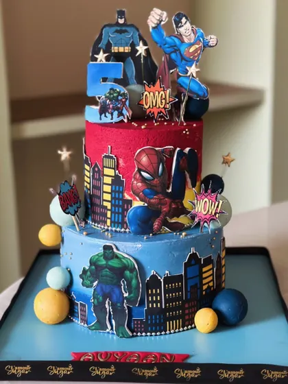 Avengers, assemble! Our superhero cakes bring the action to your party, featuring characters like Spider-Man, Superman, Batman, and the Hulk on multi-tiered cityscapes.