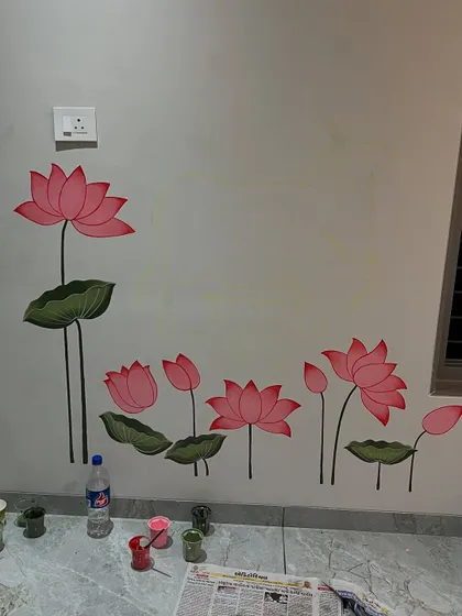 A work in progress view of the lotus flowers for the pooja room mural. I paint each petal and leaf to create a sense of calm and purity, framing the sacred space with natural beauty.