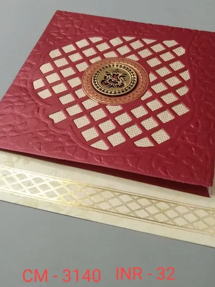 A bold red invitation with a textured finish and a central gold emblem inside a lattice window. The design is rich, traditional, and perfect for a grand announcement.