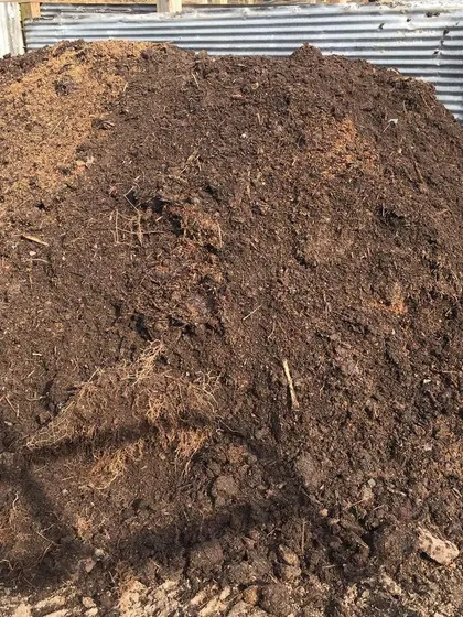 A pile of finished, aged compost ready for sale. While we work on the sifter, we sometimes sell unsifted compost, which is still a great product but at a lower price.