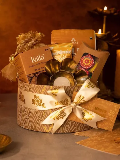 The warm, festive glow of our studio highlights this beautiful Diwali hamper. We take great care in styling our product photos to convey the feeling of celebration.