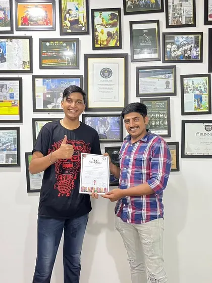 A happy graduate receives his certification from our founder, Sachin Gowda. Completing our course is a major step towards a successful career in the bar industry.