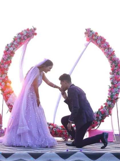 A beautiful beachside proposal with a stunning floral arch. We help you plan and capture these once-in-a-lifetime moments, ensuring your engagement photos are as breathtaking as the proposal itself.